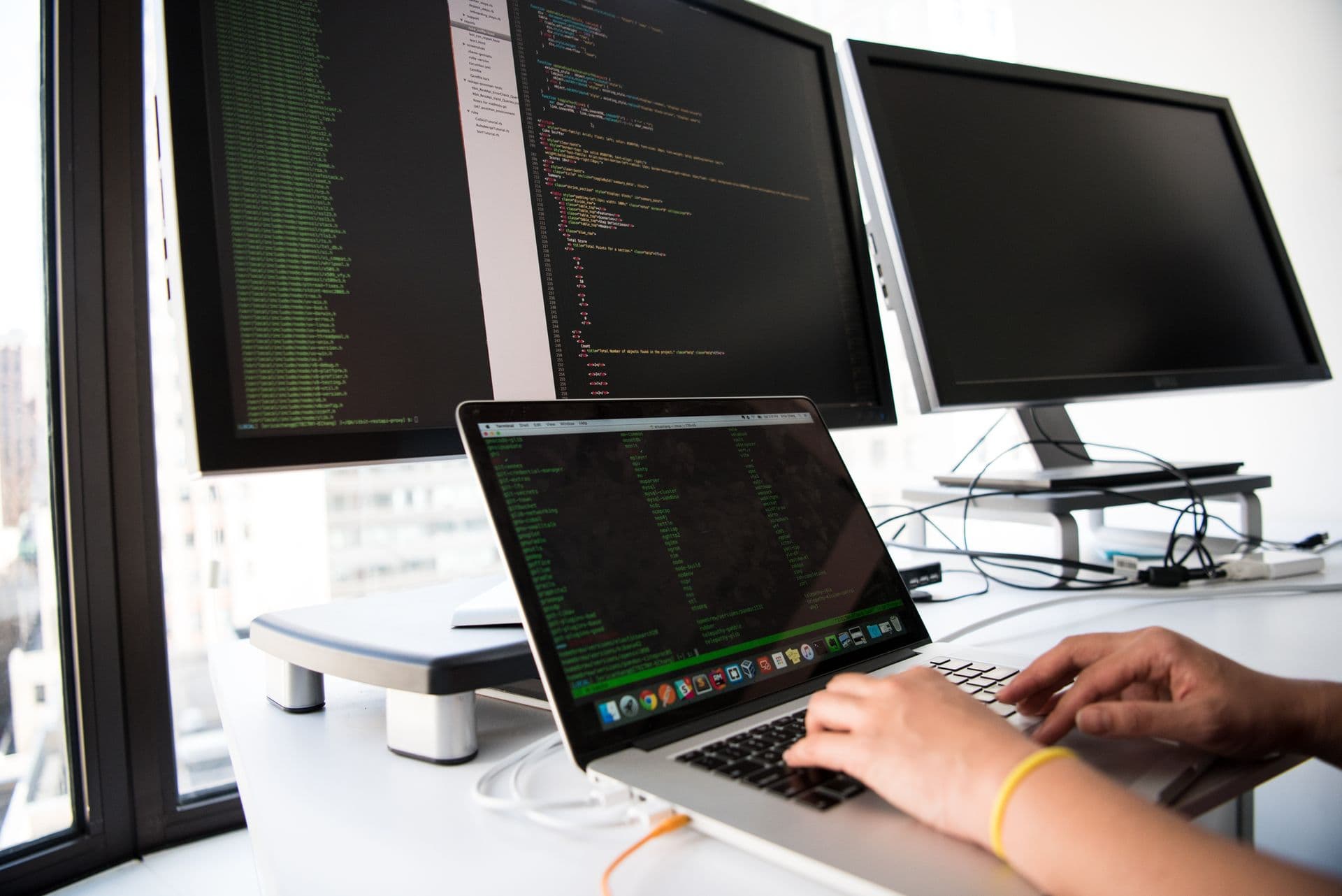 Developer workspace with AI coding assistants and multiple programming language tabs