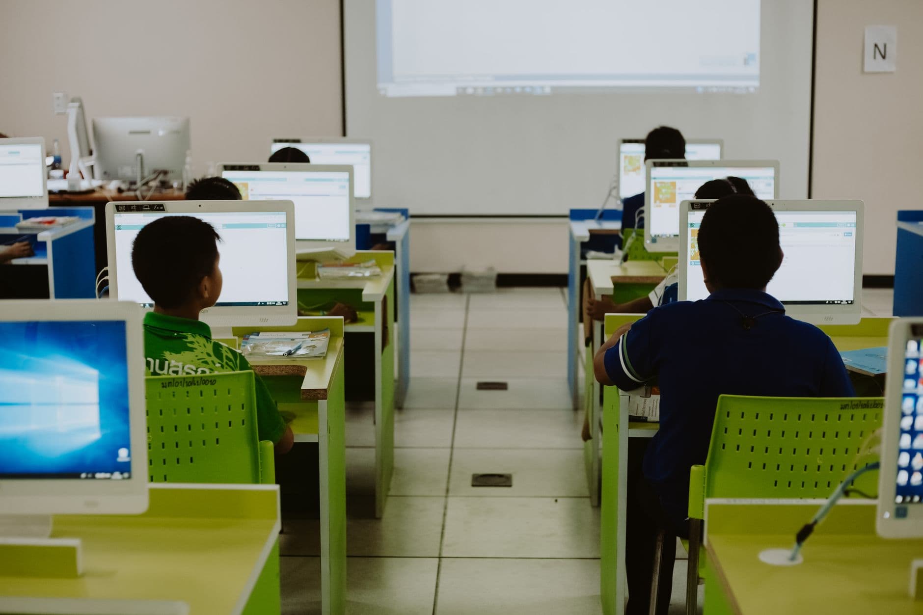 Students working at computers in a connected classroom